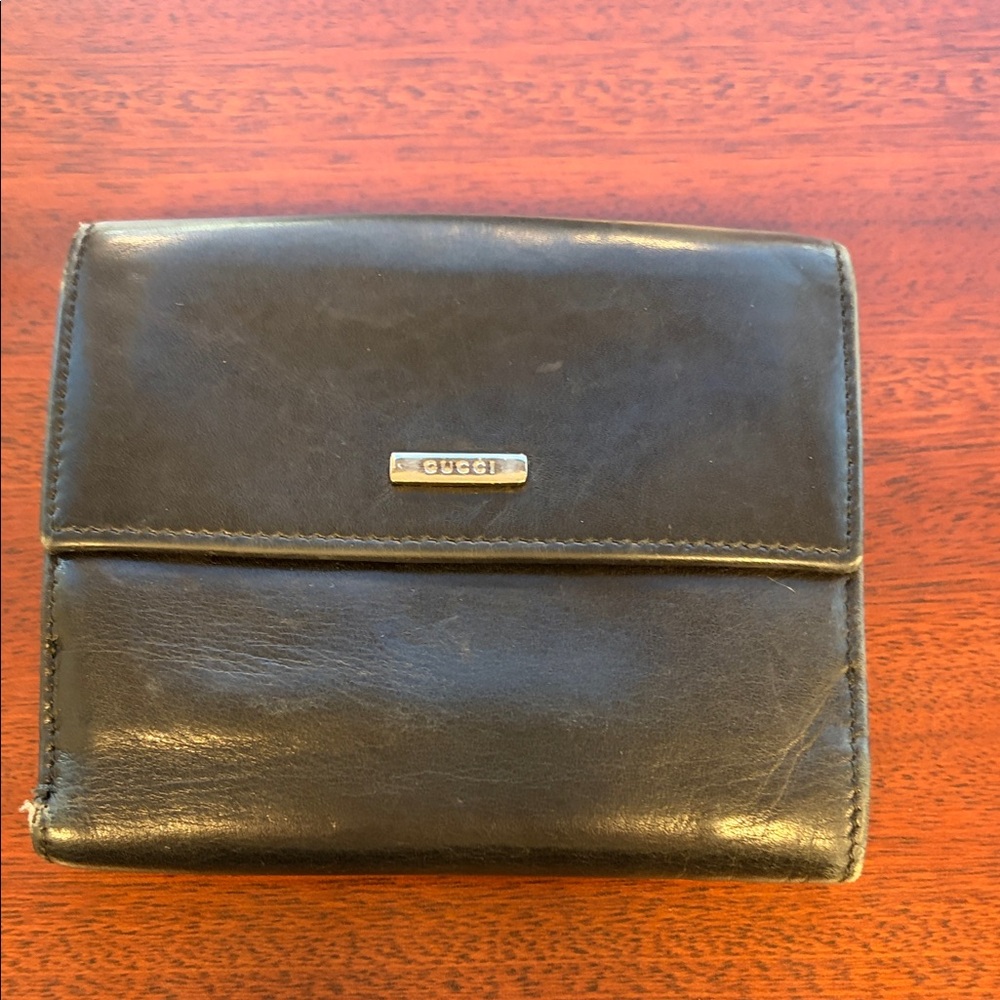 Gucci Dark Leather Wallet with Metal Logo